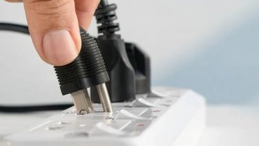 Does unplugging appliances when not in use prevent unnecessary electricity usage?